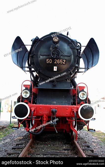 Front view of an old restored steam engine  Frontansicht einer alten restaurierten Dampflok
