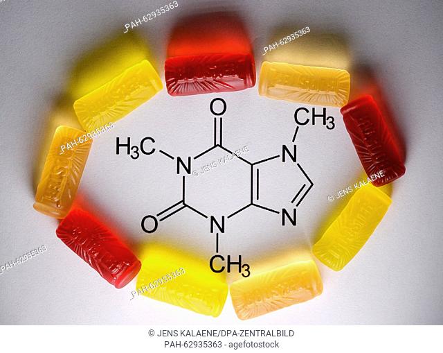 Fruit gummy candy from the brand 'Booster Energy Sweets' lie on the structural formula for caffeine in Berlin, Germany, 23 October 2015