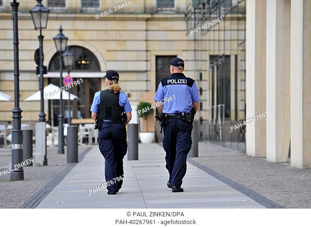 Police officers patrol at Pariser Platz in Berlin, Germany, 15 June 2013. US President Obama is going to deliver a speech there in front of invited guests on 19...