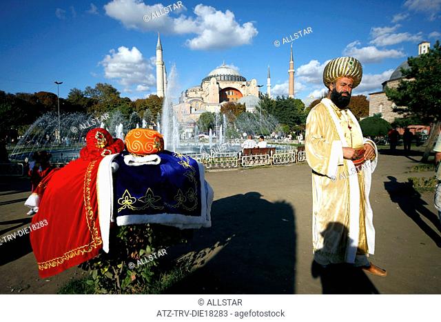 MAN DRESSED AS A SULTAN AT HAGHIA SOPHIA MOSQUE, AYA SOFYA; SULTANAHMET, ISTANBUL, TURKEY; 03/10/2011