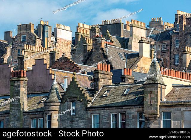 View at medieval city of Scottish Edinburgh with rooftops and chimneys