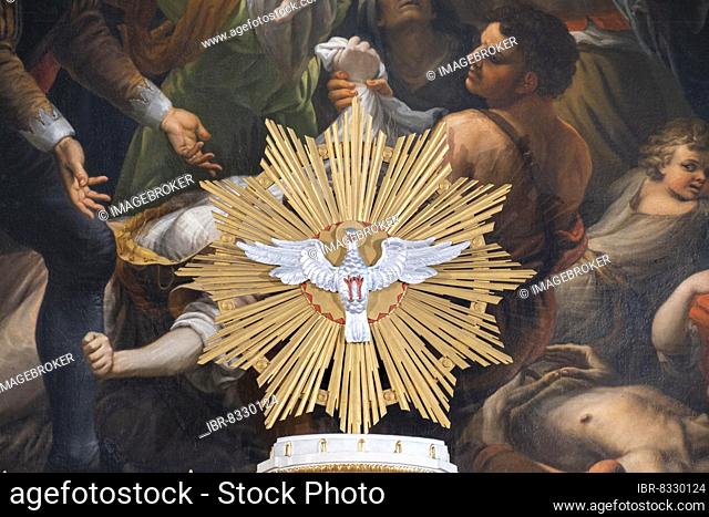 Pentecost dove in front of the altarpiece in the high altar of the collegiate parish church of St. Philip and St. James in Altötting, Bavaria, Germany, Europe