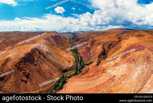 Aerial drone view of colorful eroded landform of Altai mountains in popular tourist location called Mars, Chagan-Uzun, Altai Republic, Russia