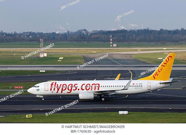 Pegasus Airlines passenger aircraft on the runway, Dusseldorf International Airport, North Rhine-Westphalia, Germany, Europe