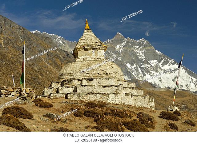 Chorten, little stupa, in Khumbu valley. Lhotse mountain (8501 m) in the background. Sagarmatha National Park (Nepal)