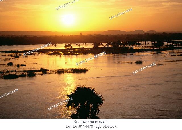 The Niger River is the principal river of western Africa, extending over 2500 miles about 4180 km . It runs in a crescent through Guinea, Mali, Niger