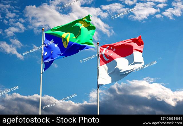 Beautiful national state flags of Singapore and Christmas Island together at the sky background. 3D artwork concept