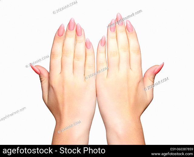 Female hands with woman's professional natural perfect nails manicure isolated on white background
