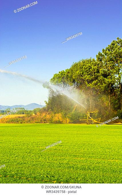 Sprinkler irrigation system at the field in Portugal