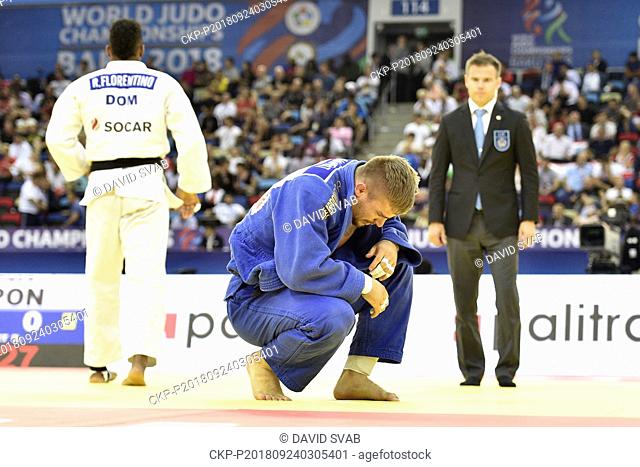 Czech judoka David Klammert (in blue) and Robert Florentino from Dominican Republic are seen during a match of men's 90kg class in World Judo Championships at...