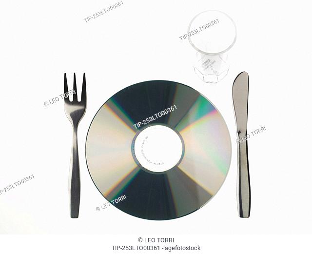 Compact disc fork, knife and glass