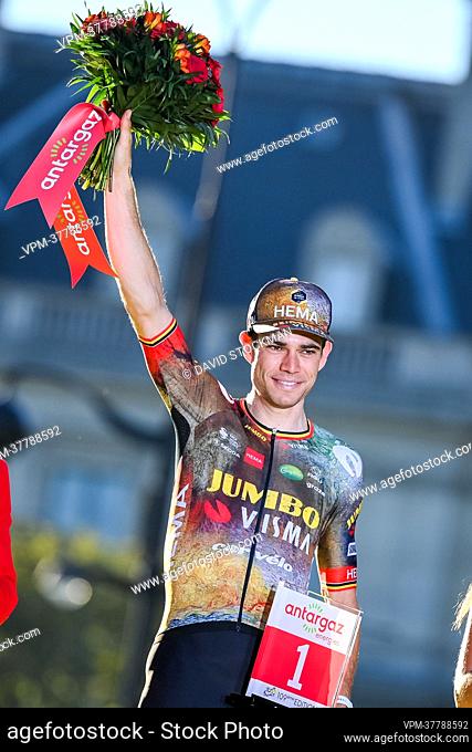 Belgian Wout Van Aert of Team Jumbo-Visma celebrates on the podium after stage 21, the final stage of the Tour de France cycling race