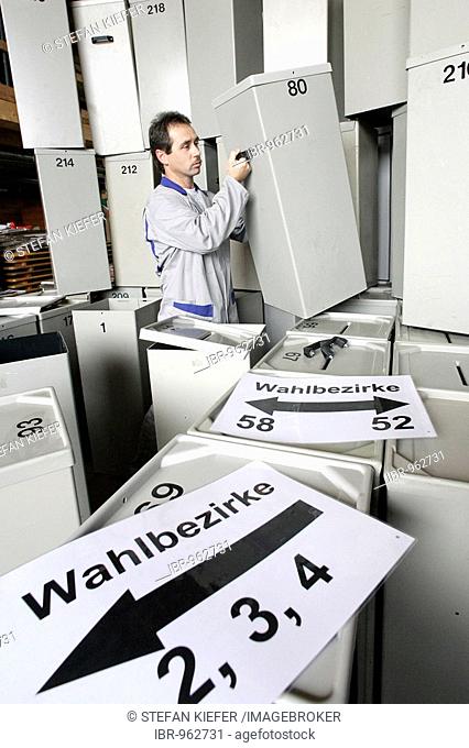 City of Regensburg employee cleaning and checking ballot boxes prior to Federal parliamentary elections on 18/9/2005 in a depot in Regensburg, Bavaria, Germany