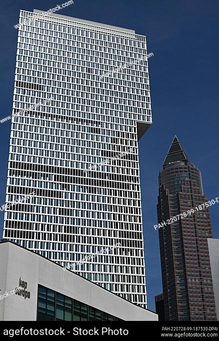 28 July 2022, Hessen, Frankfurt/Main: The ""One"" high-rise (l) by Meurer Architekten rises up in the Europaviertel next to the Messeturm