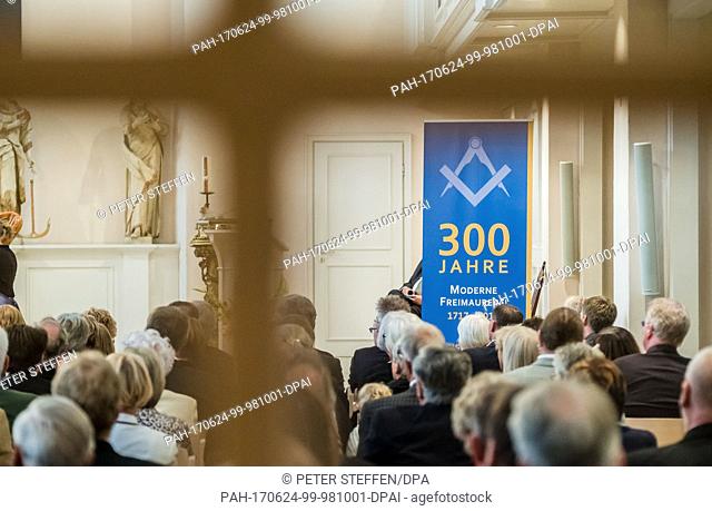 Visitors attend a public event celebrating three hundred years of Freemasonry in the St. Johannis Church in Hanover, Germany, 24 June 2017