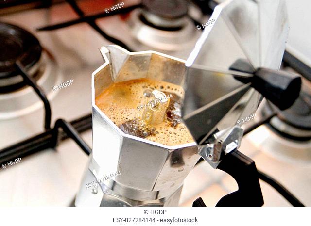 Moka Pot, on a gas hob stove, preparation of coffee