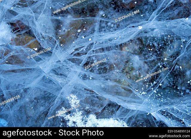 Texture of hoarfrost crystals over river ice. Natural winter snow background