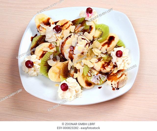 fruit salad with nut and icecream