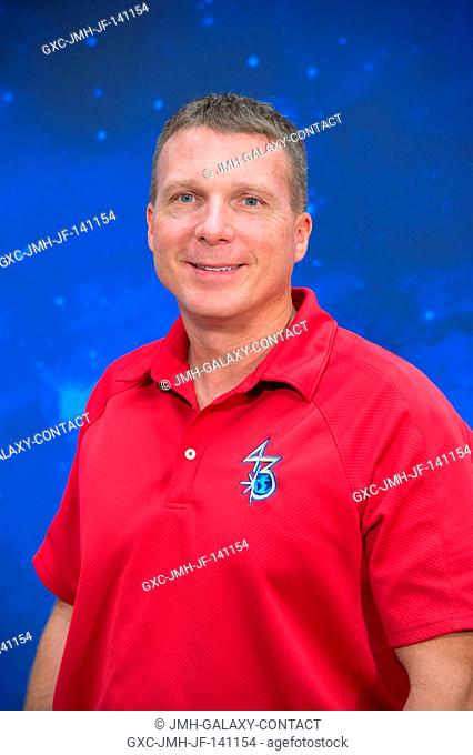 NASA astronaut Terry Virts, Expedition 42 flight engineer and Expedition 43 commander, poses for a portrait following an Expedition 4243 preflight press...