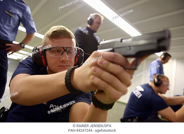 Police students practice at a shooting range at the state police school in Berlin,  Germany, 18 November 2013. A meeting of the internal affairs committee of...