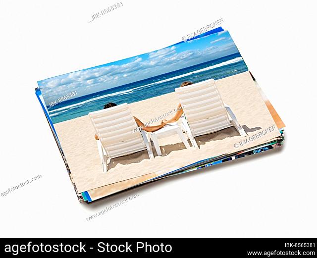 Holidays beach honeymoon concept creative background, stack of vacation photos with couple on beach image on top isolated on white background