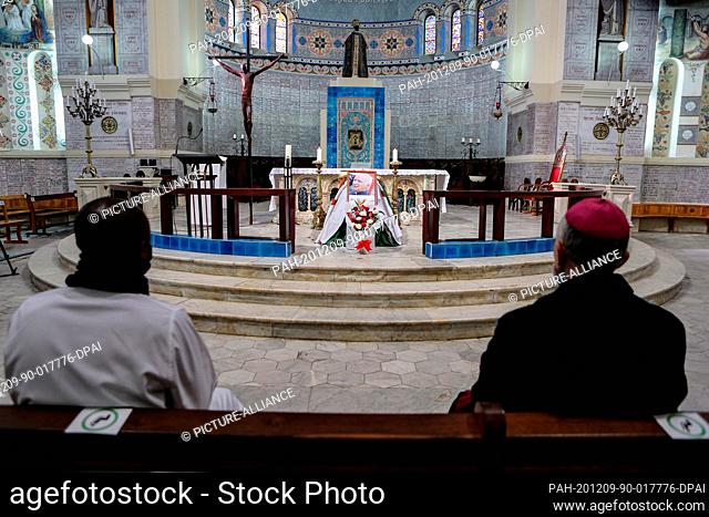 09 December 2020, Algeria, Algiers: Clerics attend the funeral service of the late French-Algerian Archbishop Henri Teissier at the Cathedral of Notre Dame...
