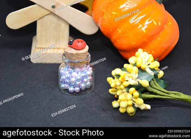 Ripe pumpkin for halloween on the background of a the holiday and mystical items