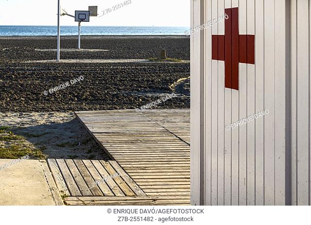 A white wall first aid in Playa Lisa beach, Alicante province, Spain