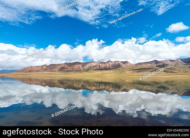 beautiful plateau lake and blue sky reflection , natural landscape on qinghai-tibet plateau , golmud kunlun mountain hinterland, China