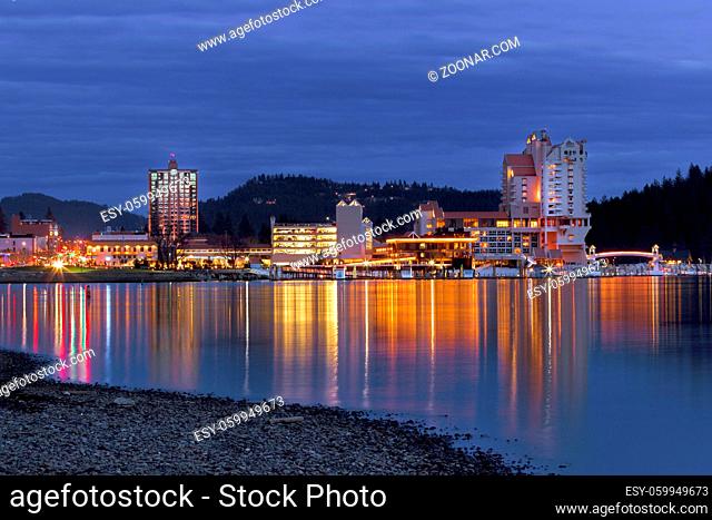 The view of downtown Coeur d'Alene early in the evening from the beach area