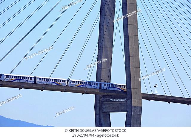 Skytrain Rapid transit bridge crossing the Fraser River from new Westminster to Surrey, British Columbia