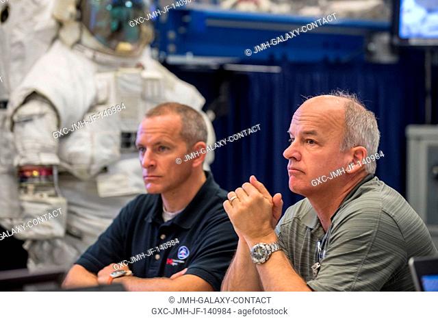 NASA astronaut Jeff Williams (right), Expedition 47 flight engineer and Expedition 48 commander; and Canadian Space Agency astronaut David Saint-Jacques...