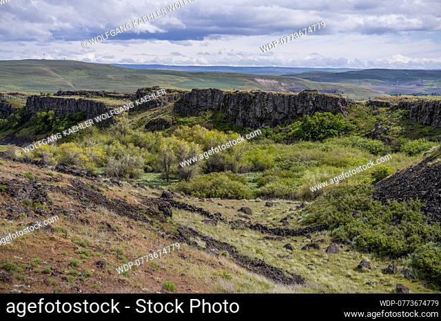 View of lava bluffs and basalt formations (volcanic formations about 40-60 million years old)from the Dalles Mountain Road near Lyle, Washington, USA