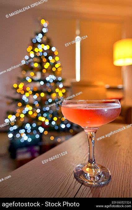 Rose Champagne Wine and Christmas Tree Background