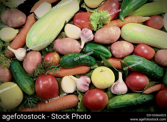 Potatoes, tomatoes, zucchini , carrots and other fruits and vegetables. There are presented a big plan.g