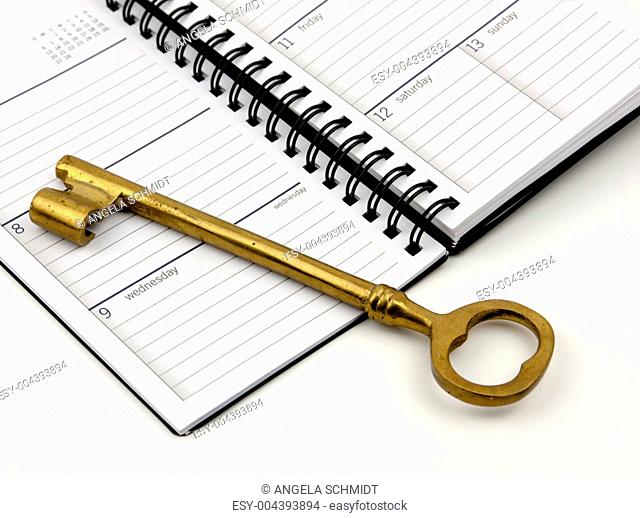 Golden Key On A Daily Planner