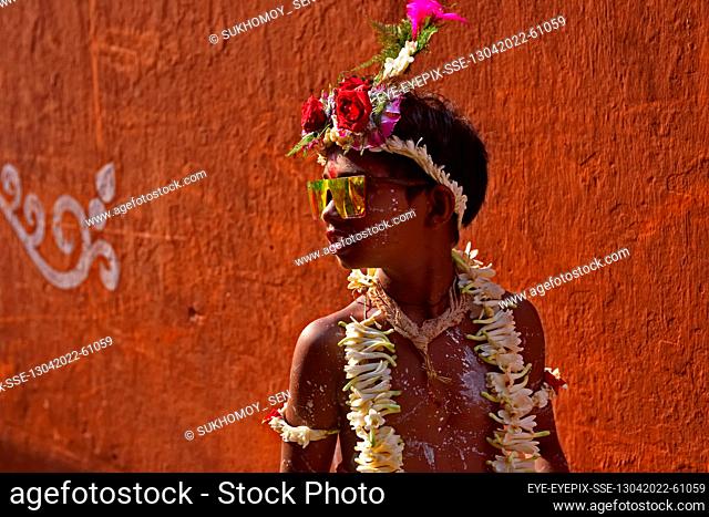 KOLKATA, INDIA - APRIL 13, 2022: A Child is seen dressed as mythgological figures (God and Goddess), during Shivagajan festival