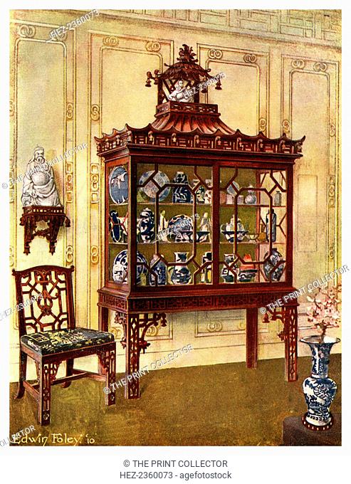 Carved china case in Chippendale's Chinese manner, 1911-1912. With a Chinese style Chippendale chair. A print from The Book of Decorative Furniture its Form