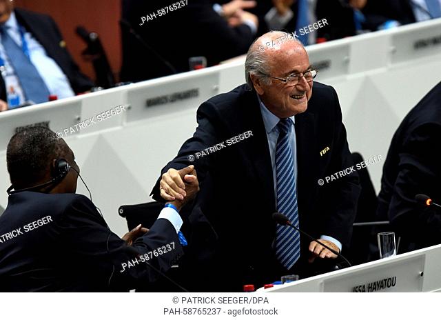 FIFA President Joseph S. Blatter (R) and Cameroonian Issa Hayatou, CAF President (General Confederation of African Football) and FIFA Senior Vice President