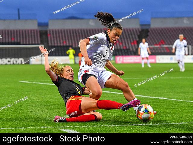 Belgium's Janice Cayman and Albania's Arbenita Curraj fight for the ball during the match between Belgium's national women's soccer team the Red Flames and...