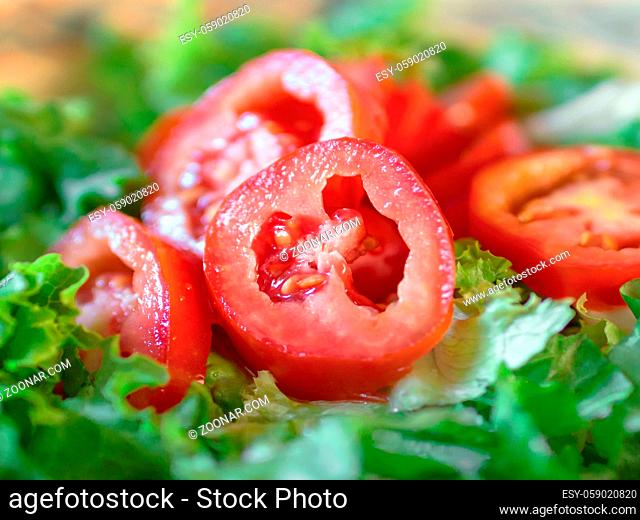 Salad with lettuce and fresh tomatoes
