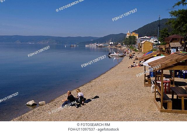 beach people beautiful relaxed shore boats in
