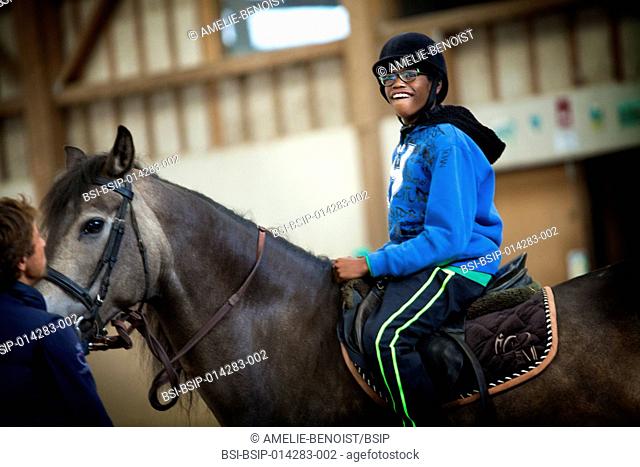 Reportage on Sylvain, 11 years old, suffering from autism. He was diagnosed when he was 7. Once a week he goes to an equestrian centre for a riding therapy...
