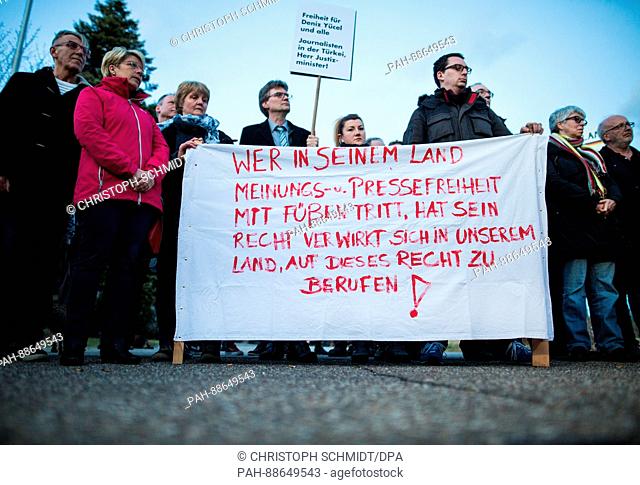 Citizens and politicians demonstrate in front of an empty festival hall in Gaggenau, Germany, 2 March 2017. The Turkish Minister of Justice was meant to speak...