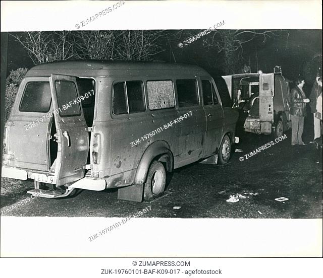 Jan. 01, 1976 - The bloodstained read in front of a bullet spattered mini bus where 10 protestant workers were gunned down by terrorists last night in South...
