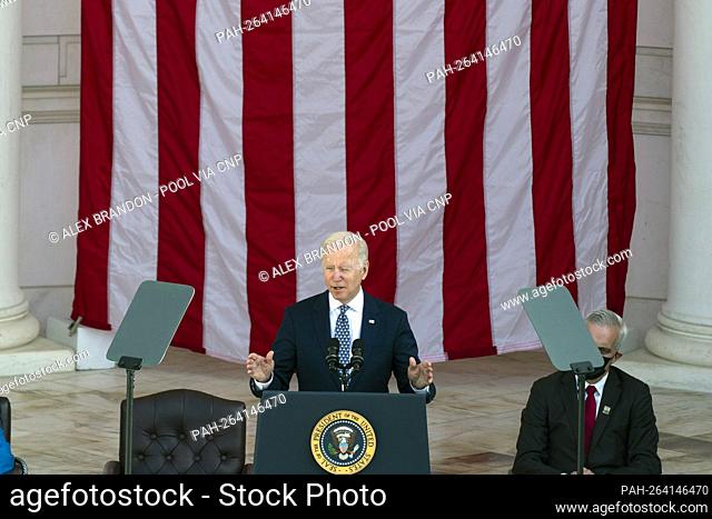United States President Joe Biden speaks in the the Memorial Amphitheater, in Arlington National Cemetery, on Veterans Day, Thursday, Nov