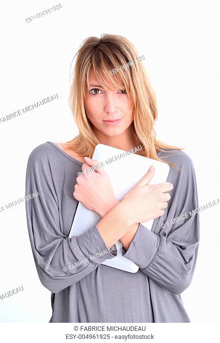 Blond woman with electronic tablet on white background