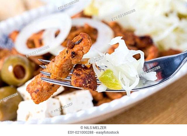 gyros with tzatziki coleslaw olives and feta cheese