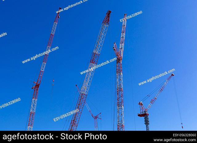 January 29, 2020, Tokyo, Japan - Cranes are seen in a construction zone in Toyosu area