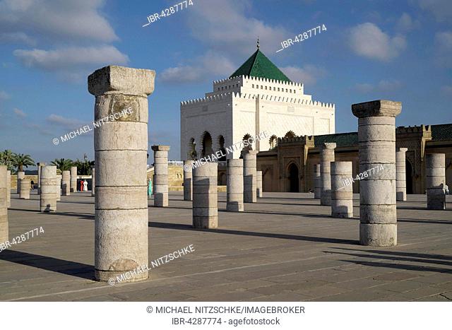 Remains of columns of the former prayer hall of the Hassan Mosque, with the Mausoleum of Mohammed V, Rabat, Rabat province, Morocco